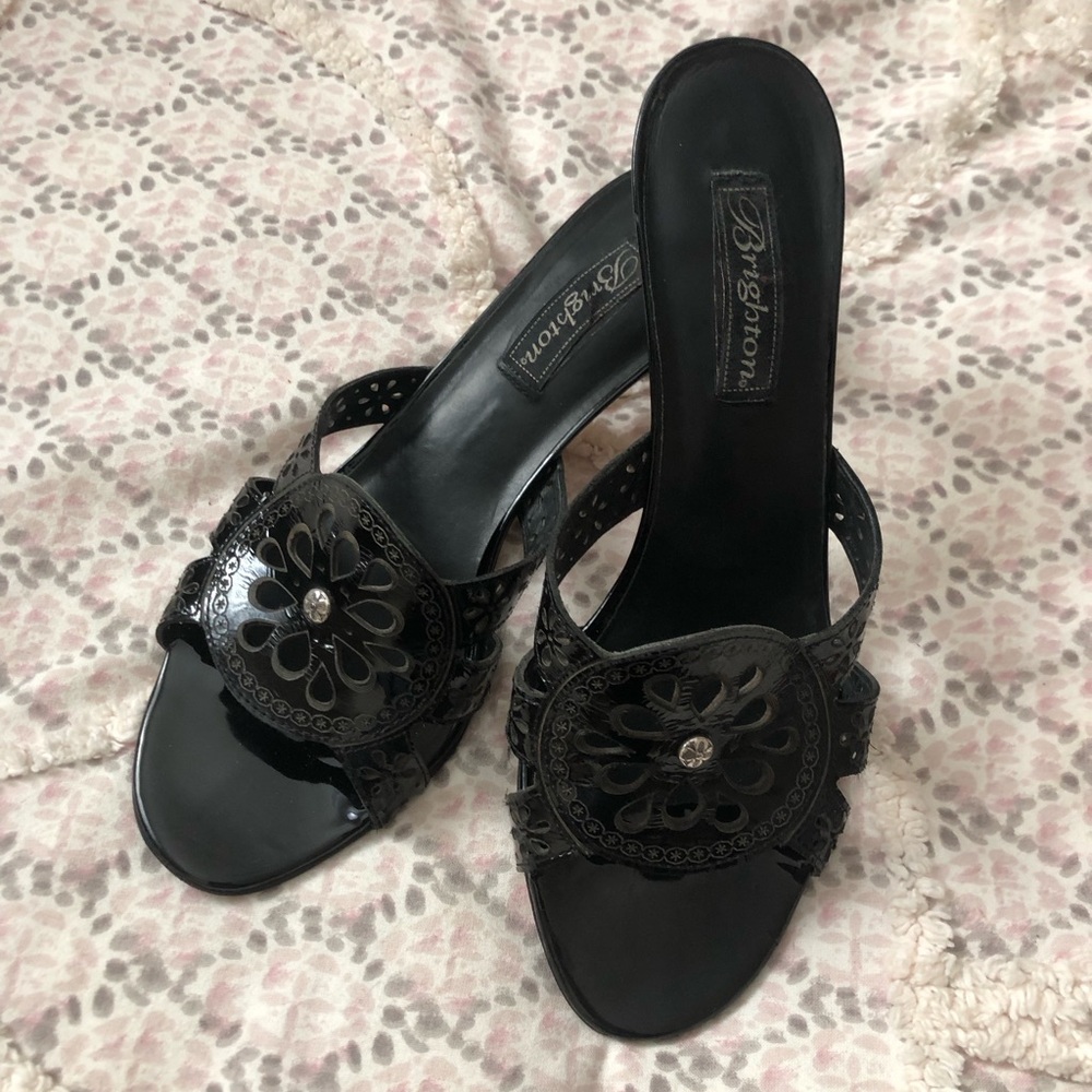 Brighton Black Laser-Cut Tulip Slide Heels with Rhinestone Accent in size 10M.
